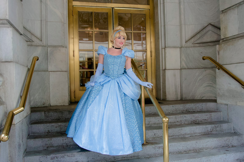 Cinderella on the steps of the Plaza Hotel NYC