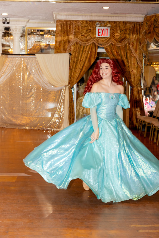 Princess Ariel greets the children at the Astoria Princess Ball