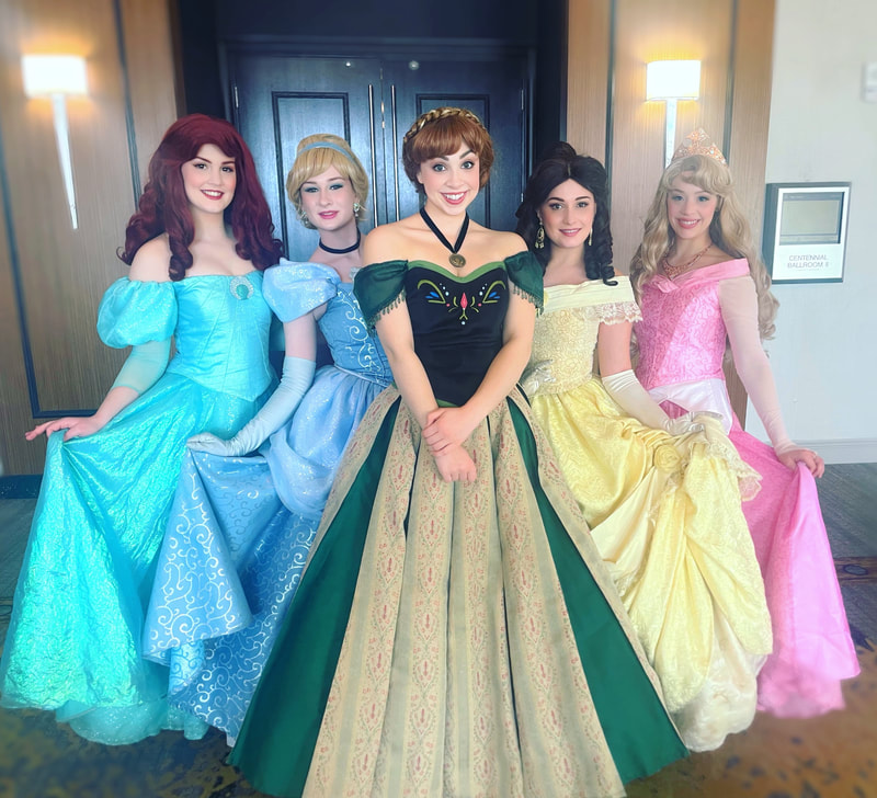 Ariel, Cinderella, Anna, Belle, and Sleeping Beauty pose at a princess ball in NYC