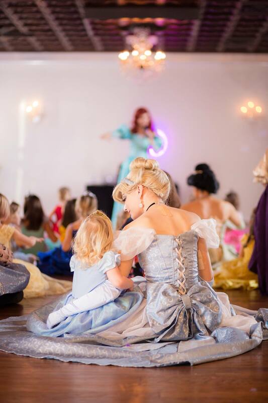 Cinderella and little princess at the royal ball