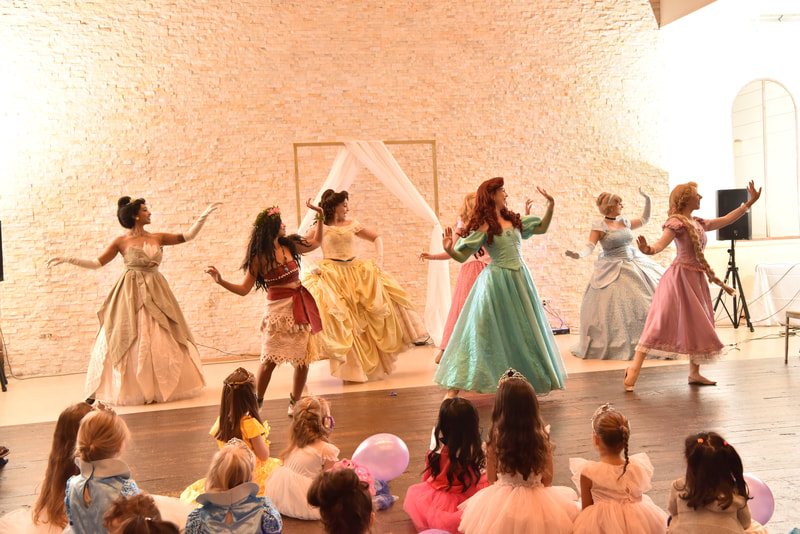 Princesses dance at the royal Astoria princess party